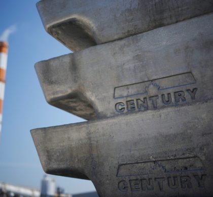 Aluminum ingots, or sows, are stacked on the grounds of Century Aluminum's Hawesville plant. (Luke Sharrett for The Washington Post)